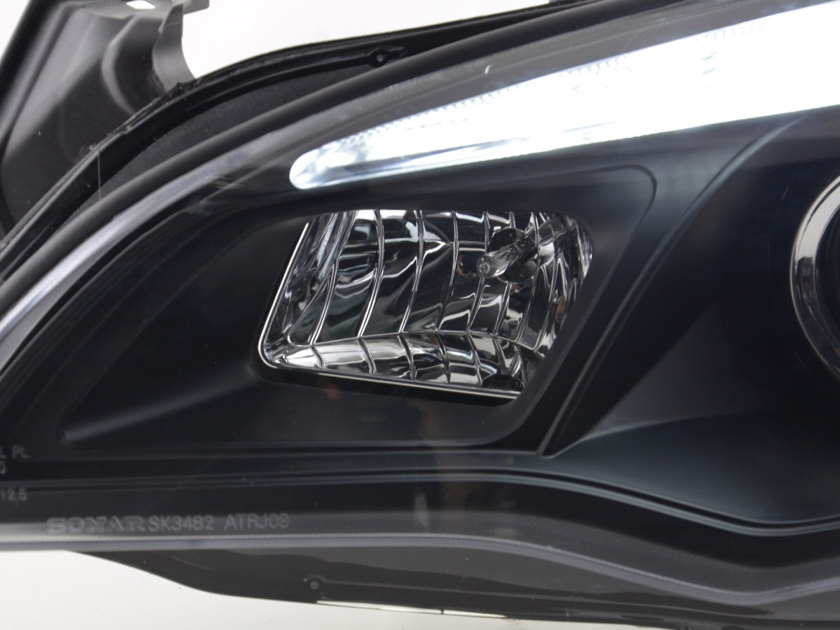 Scheinwerfer Set Opel Astra J 5-türig Bj. 2009-2012 schwarz Asien-Modell